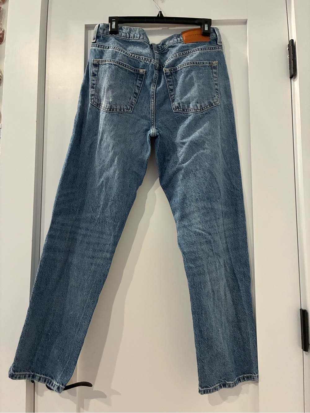Lucky Brand light blue denim jeans with red logo